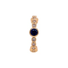 RUCHI Eternity-Ring aus Gelbgold mit blauem Saphir und Diamant in Lünettenfassung
