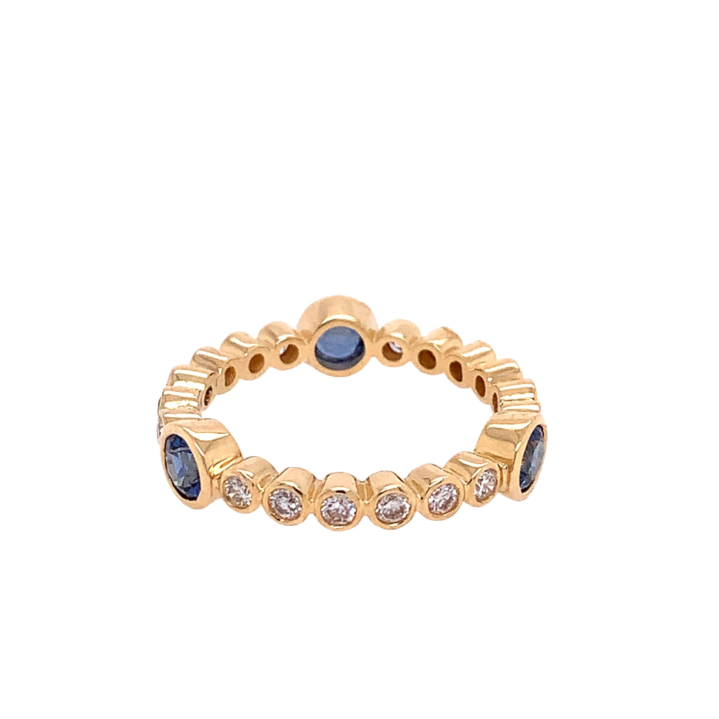 Contemporary RUCHI Blue Sapphire and Diamond Yellow Gold Bezel-Set Eternity Band For Sale