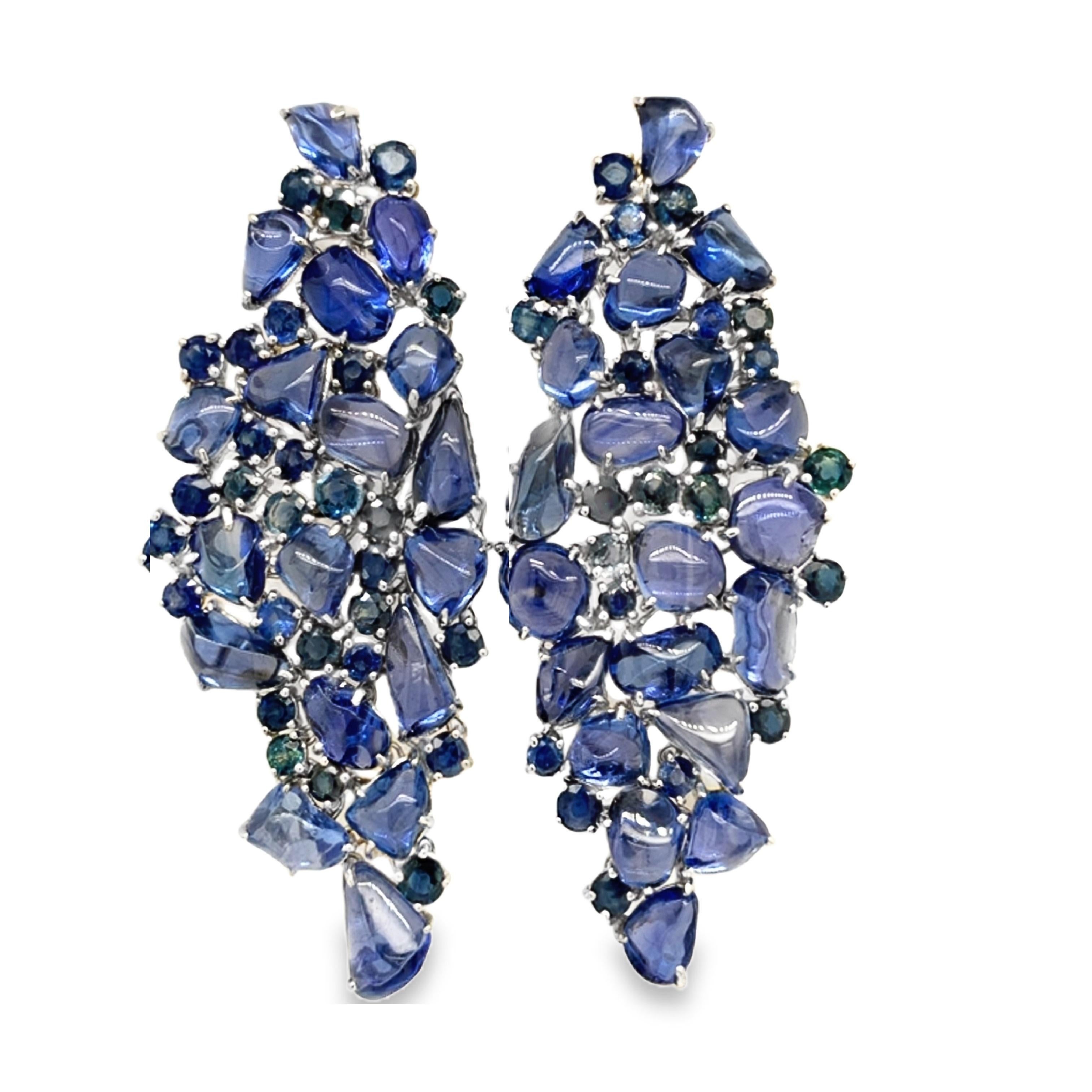 Midnight Blue Collection 

Chandelier drop earrings set in 18K white gold, with round and nugget Blue Sapphires in contrasting tones, with a post closure

Blue Sapphire: 65.18ct total weight.
Height - is approximately 6.5cm/2.56inches.
Width - is