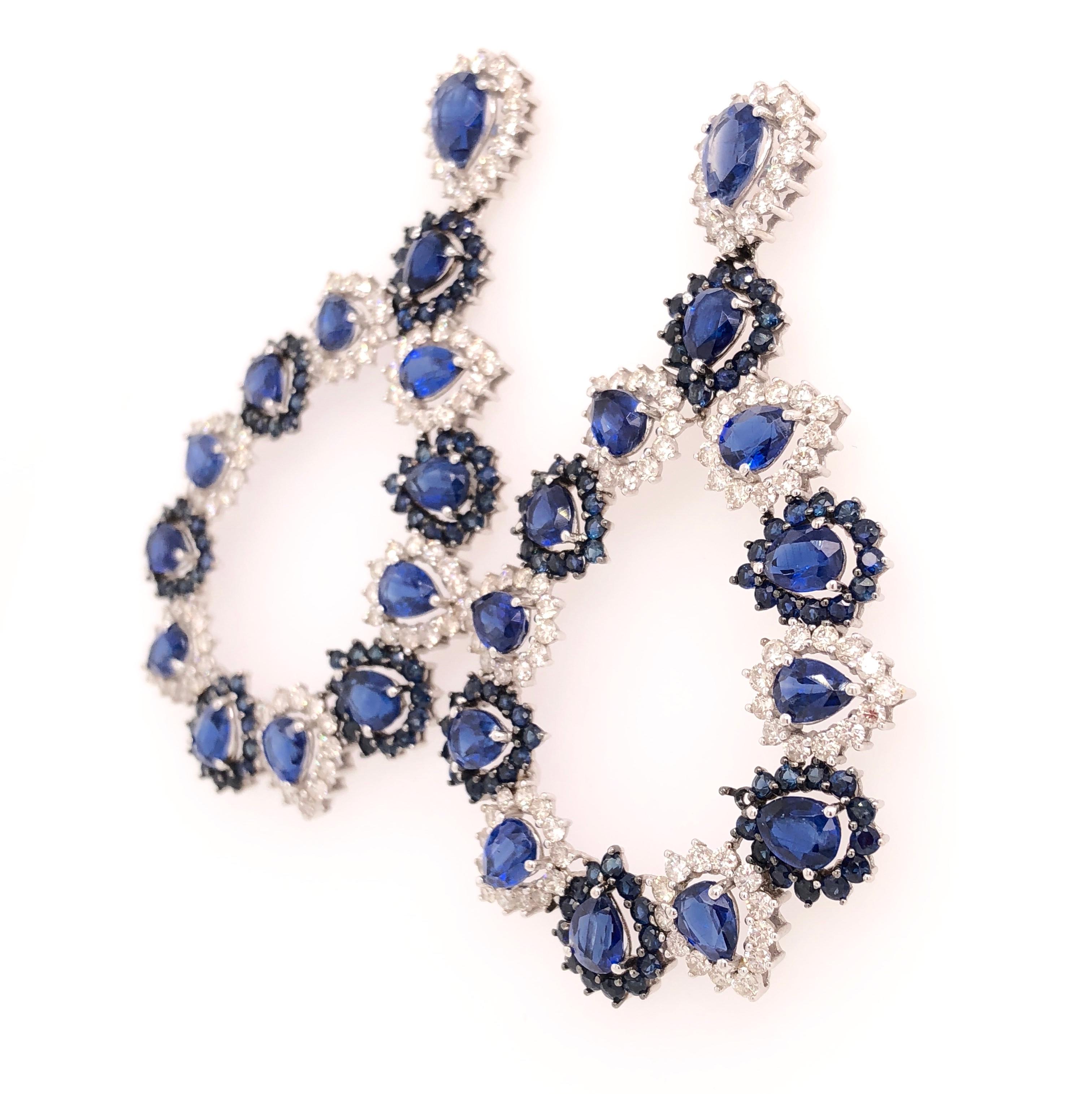 18K White Gold.
Sapphire: 3.93ct total weight.
Kyanite: 11.75ct total weight.
Diamonds: 3.60ct total weight.
All diamonds are G-H/SI stones.
Width - is approximately 3.3cm/1.30inches.
Height - is approximately 6cm/2.37inches.