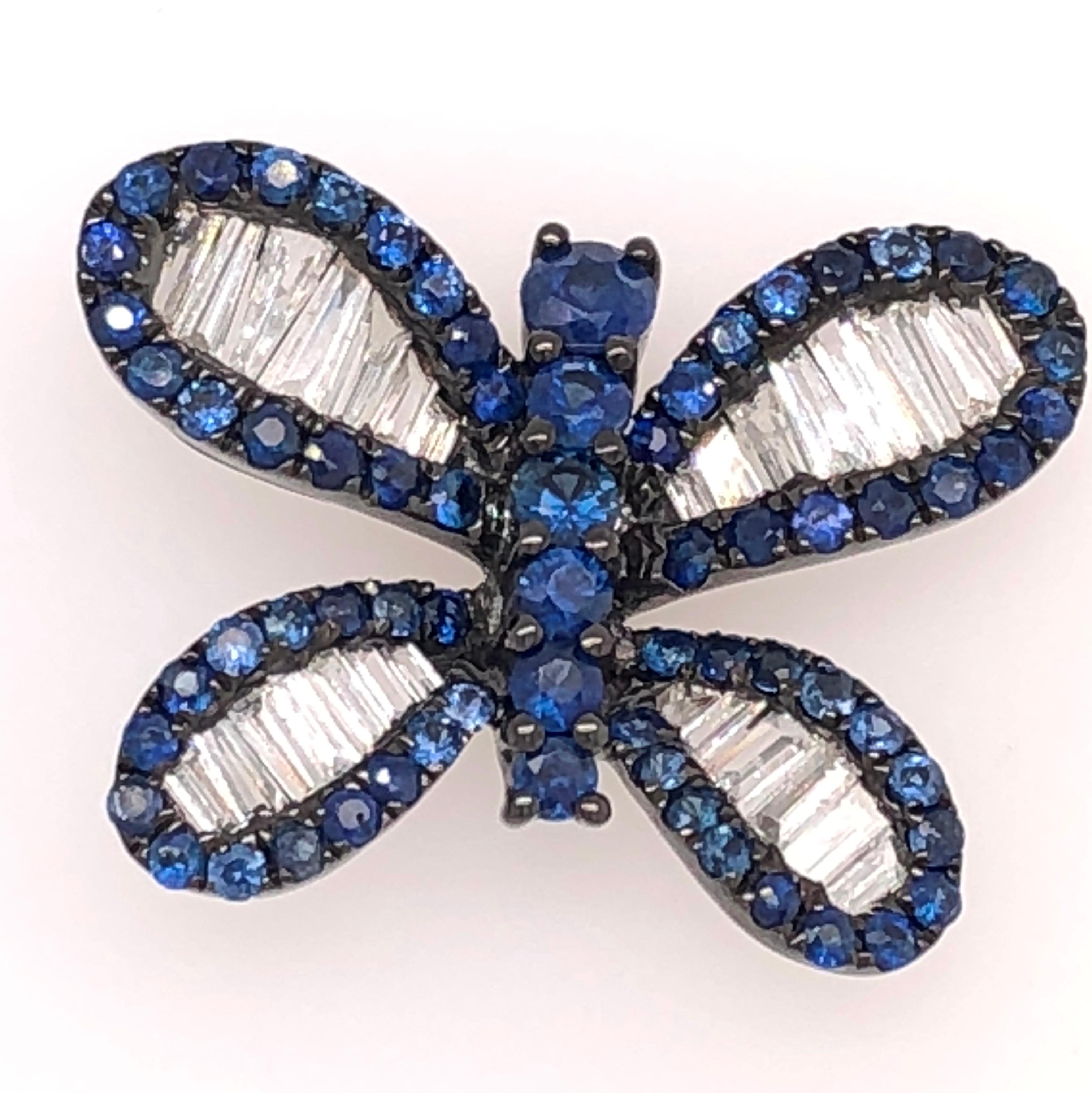 Midnight Blue Collection 

Butterfly shaped deep Blue Sapphires and baguette Diamond studs set in 18K black rhodium gold. 

Blue Sapphires: 1.34ct total weight.
Diamonds: 0.66ct total weight.
All diamonds are G-H/SI stones.
Width of butterfly -  is