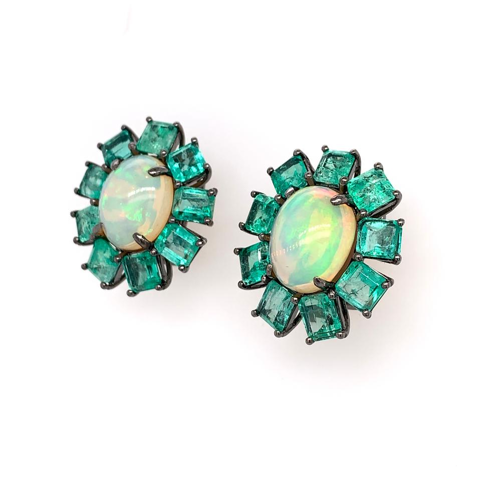 Green Lagoon Collection

Colombian Emerald and Ethiopian Opal stud earrings set in 18K black rhodium gold.

Emerald: 7.83ct total weight.
Ethiopian Opal: 6.76ct total weight.
