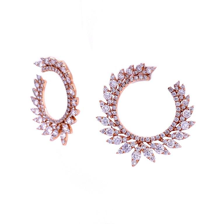 Scintillation Collection

Beautiful Diamond C-Shape earrings set in 18k rose gold.

Diamonds: 3.29ct total weight.
All diamonds are G-H/SI stones.