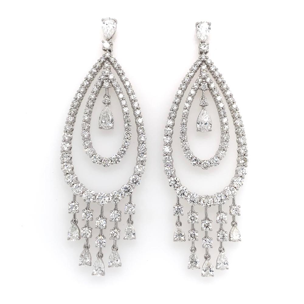 Scintillation Collection

Round and pear shaped Diamond chandelier earrings set in 18K white gold.

Diamonds: 9.864ct total weight.
All diamonds are G-H/SI stones.