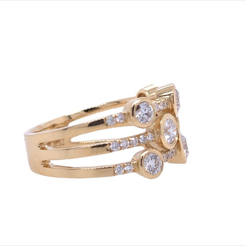 Scintillate Collection,

This on- trend ring features 3 rows of Bezel set Diamonds all made with 18K yellow gold.

Diamond: 0.94ct total weight
All Diamonds are G-H/SI stones. 