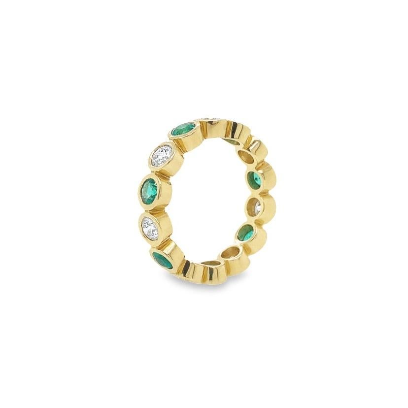 emerald band ring yellow gold