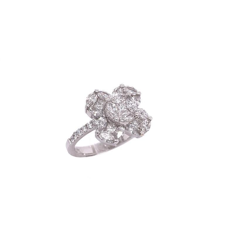 Infinity Collection 

Diamond infinity style flower ring featuring round, princess, and marquise cut Diamonds set in 18K white gold.

Diamonds: 1.98ct total weight.
All diamonds are G-H/SI stones.