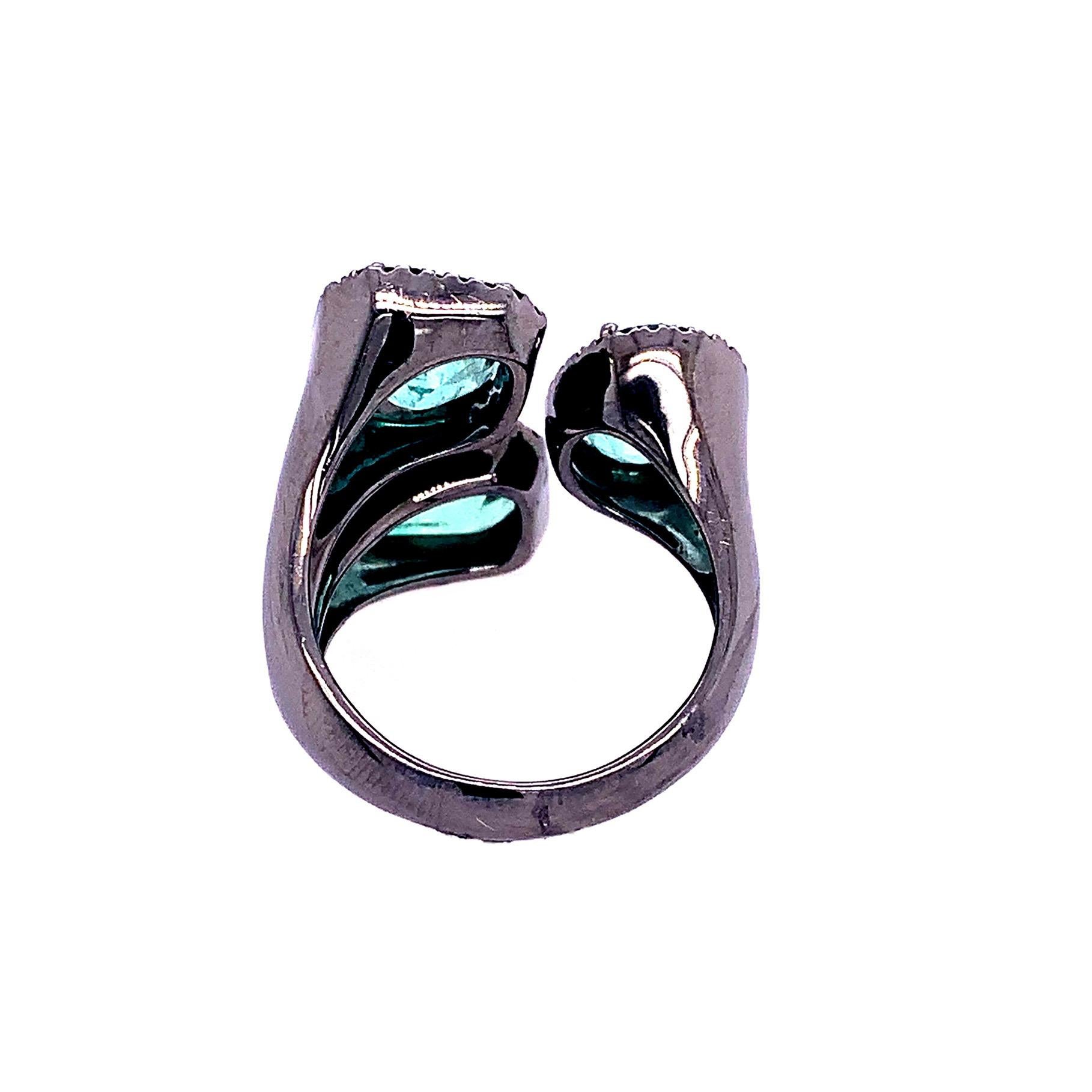 black diamond and emerald ring