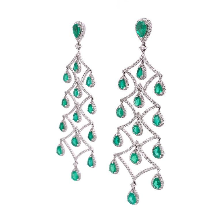 Jardin Collection 

Elegant Emerald and Diamond chandelier earrings set in 18K white gold. 

Emeralds: 7.34ct total weight. 
Diamonds: 3.95ct total weight. 
All diamonds are G-H/SI stones.