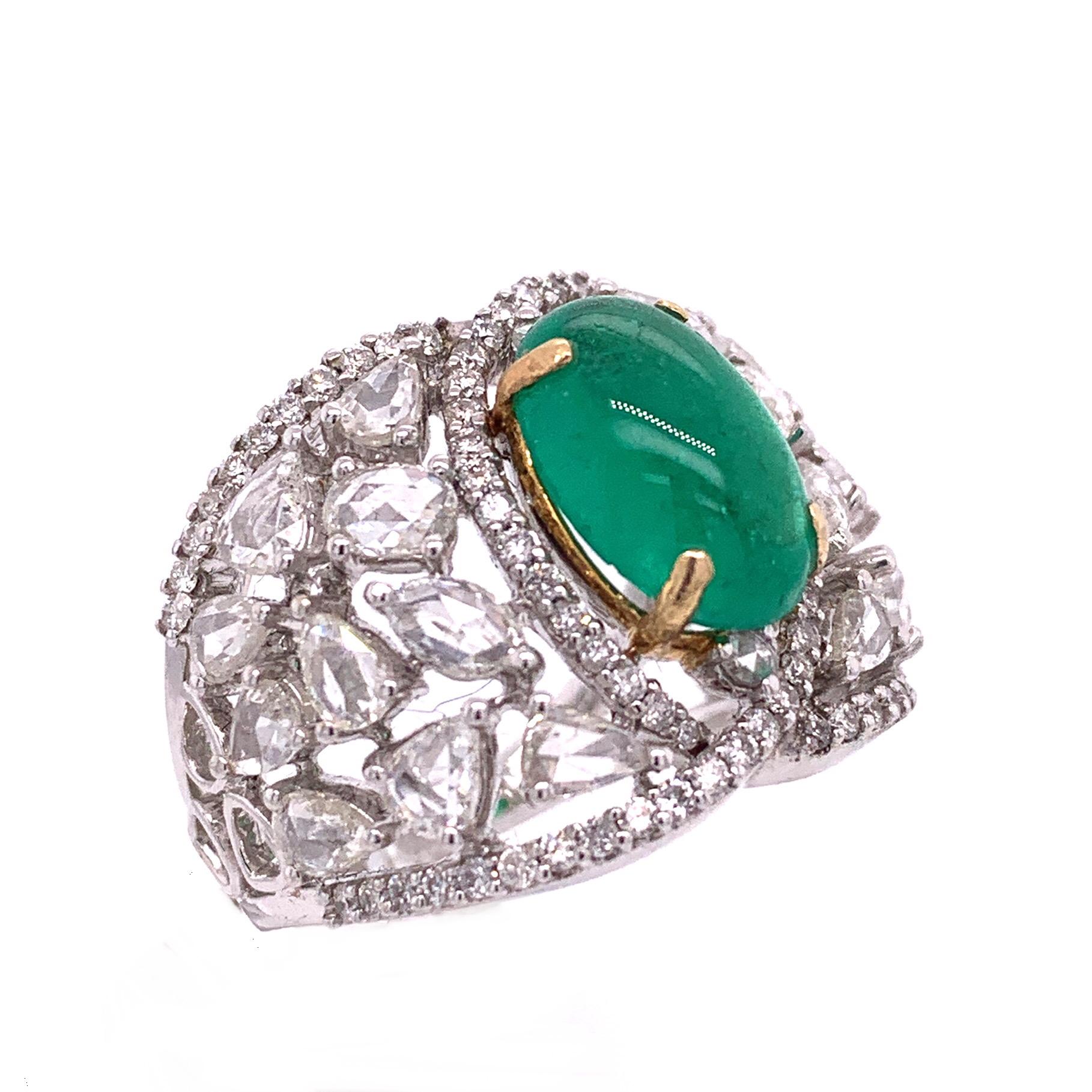 18K White & Yellow gold. 
US size 7.
Emeralds: 3.22 ct total weight.
Rose Cut Diamonds: 2.07ct total weight.
Diamonds: 0.75ct total weight.
All diamonds are G-H/SI stones.

