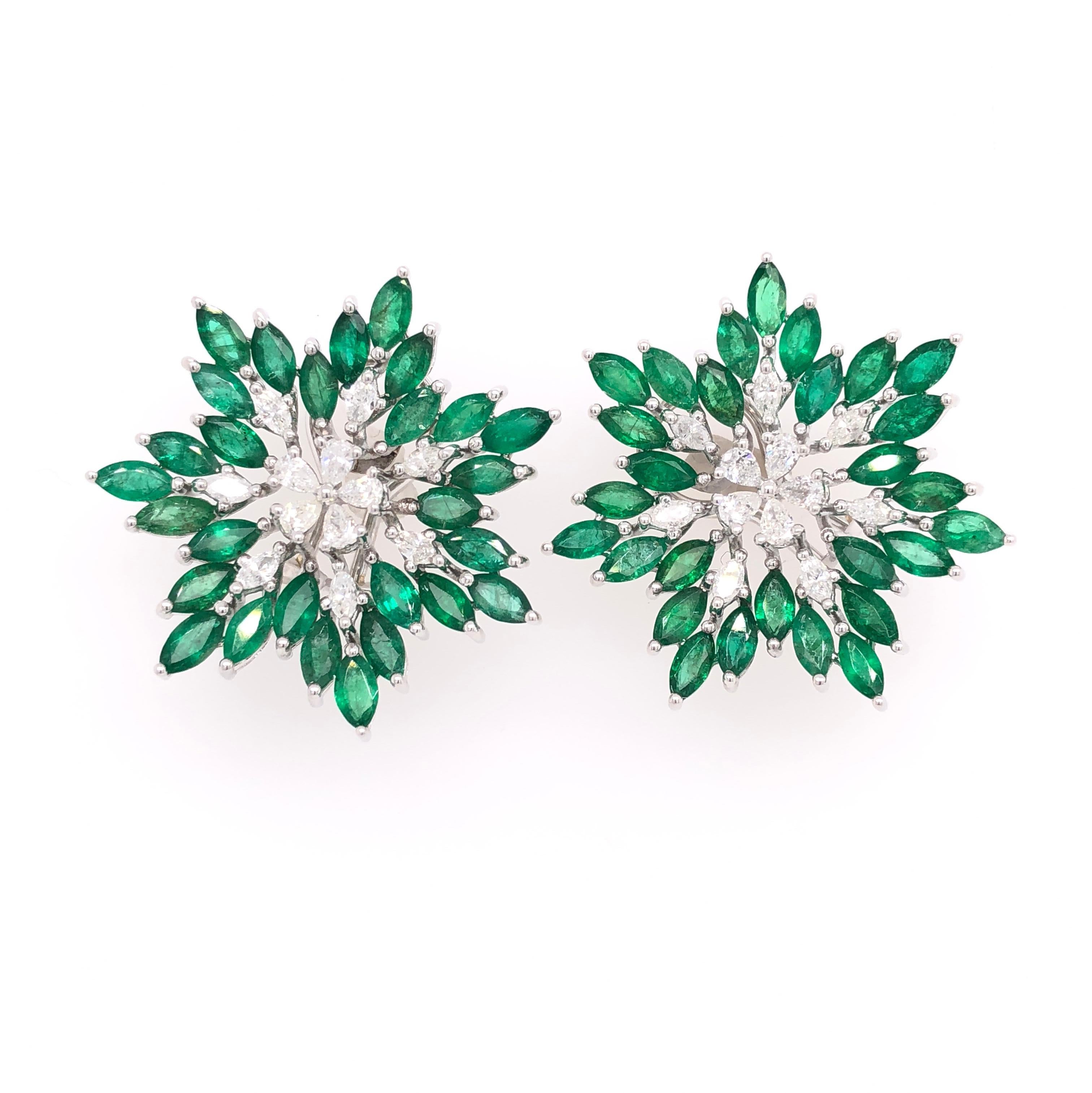 Green Lagoon Collection 

Emerald and Diamond flower shaped stud earrings with a clip post set in 18K white gold. 

Emerald: 7.47ct total weight.
Diamonds: 1.08ct total weight.
All diamonds are G-H/SI stones.
Diameter - is approximately