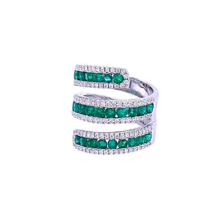 Green Lagoon Collection

Vibrant Emerald and Diamond statement wraparound ring set in 18k white gold. US size 6.5

Emeralds: 2.24ctw.
Diamonds: 0.96ctw. 
All diamonds are G-H/SI stones.