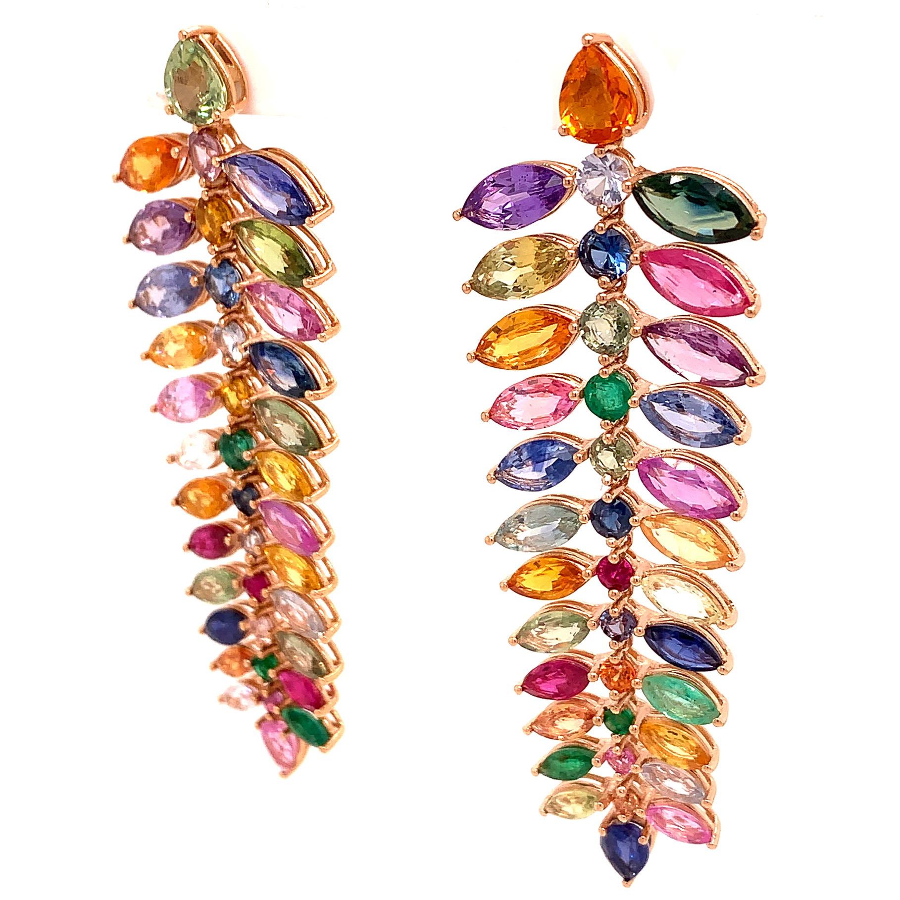 Play of Colors Collection

Emerald and Muticolor Sapphire chandelier earrings set in 18K rose gold. These earrings have movement they are not stiff. 

Emerald: 0.89ct total weight.
Sapphire: 21.76ct total weight.
