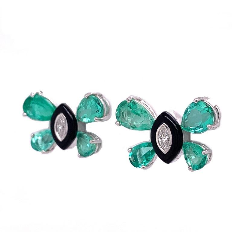 Black Agate Collection 

Fun butterfly studs featuring pear shape Emeralds, marquise shape Diamonds with black Agate halo set in 18K white gold. 

Emerald: 3.46ct total weight.
Black Agate: 0.50ct total weight.
Diamonds: 0.14ct total weight.
All