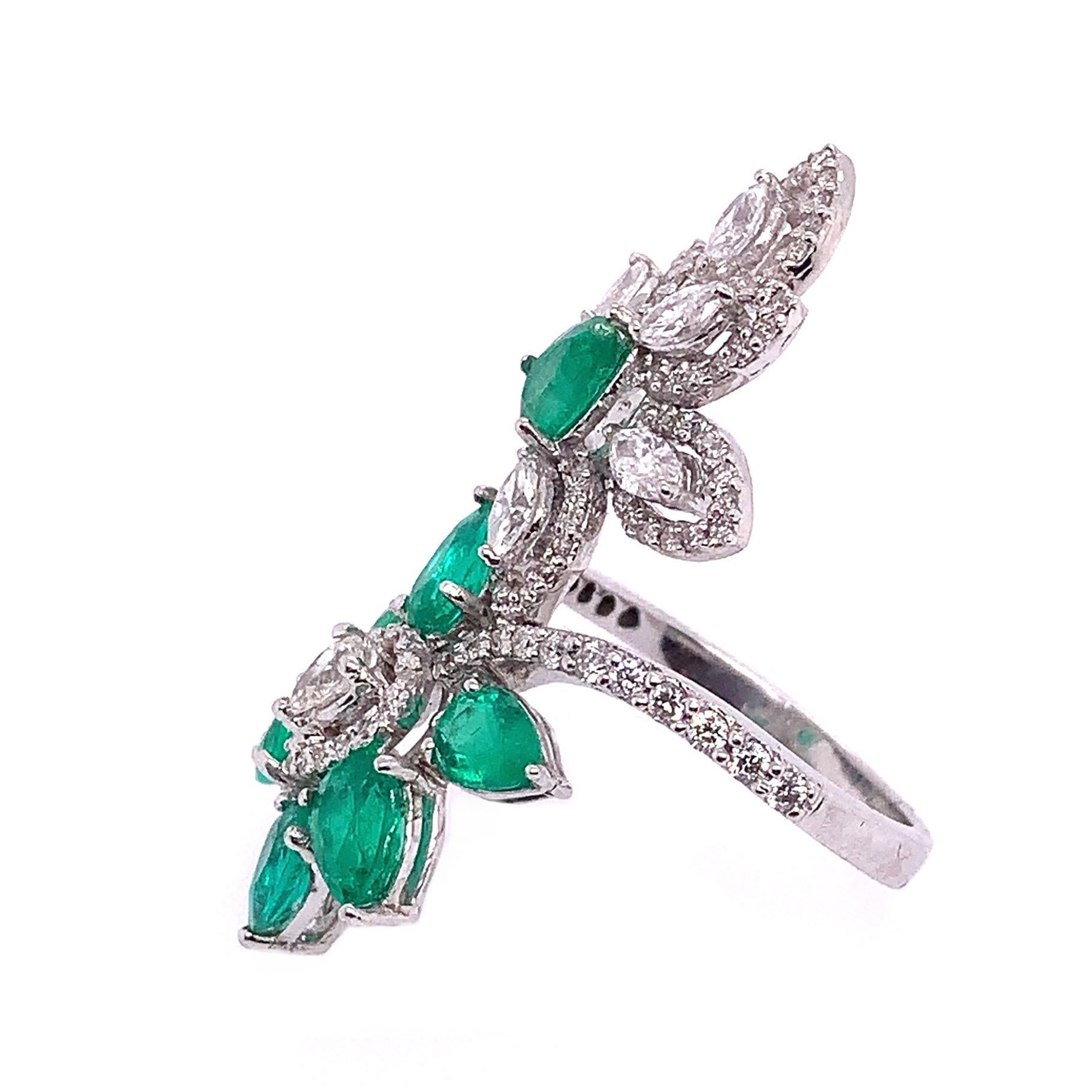 Jardin Collection

Leaf and flower cluster ring with pear shape Emerald and Diamond set in 18K white gold. Size 6.5 U.S.

Emerald : 2.30ct total weight.
Diamond : 1.41ct total weight.
All diamonds are G-H/SI stones.
