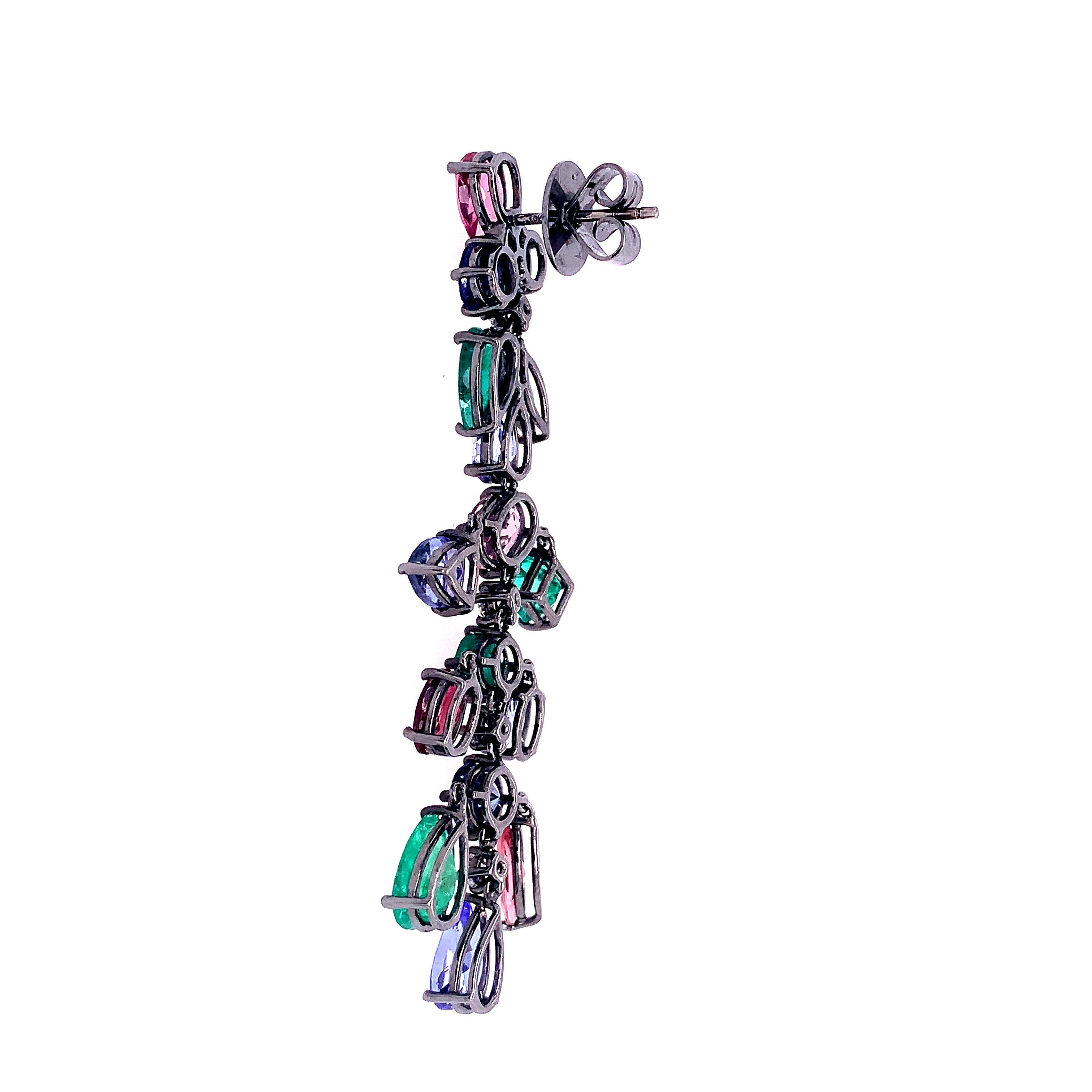 18K Black Gold
Emerald: 5.20 ct total weight.
Pink Tourmaline & Tanzanite: 11.53 ct total weight.
Diamond: 0.50 ct total weight.
All diamonds are G-H/SI stones.
