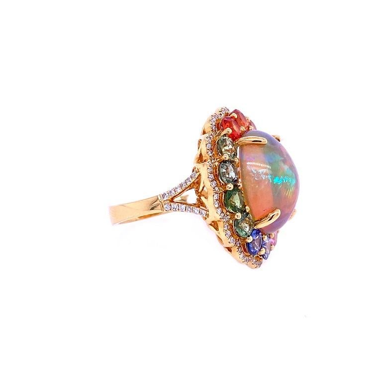18K Yellow Gold
Ethiopian Opal: 6.52ct total weight.
Multi Colored Sapphires: 4.18ct total weight.
Diamonds: 0.32ct total weight.
All diamonds are G-H/SI stones.