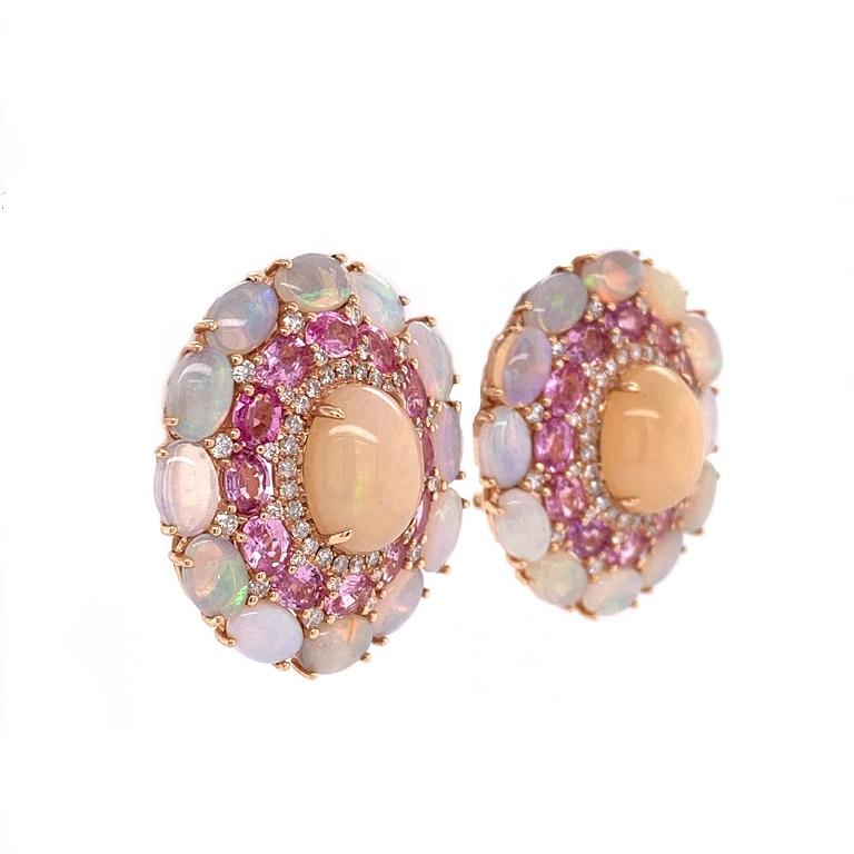18K Rose Gold
Ethiopian Opal: 10.71ct total weight.
Pink Sapphire: 4.37ct total weight.
Diamonds: 0.87ct total weight. 
All diamonds are G-H/SI stones.