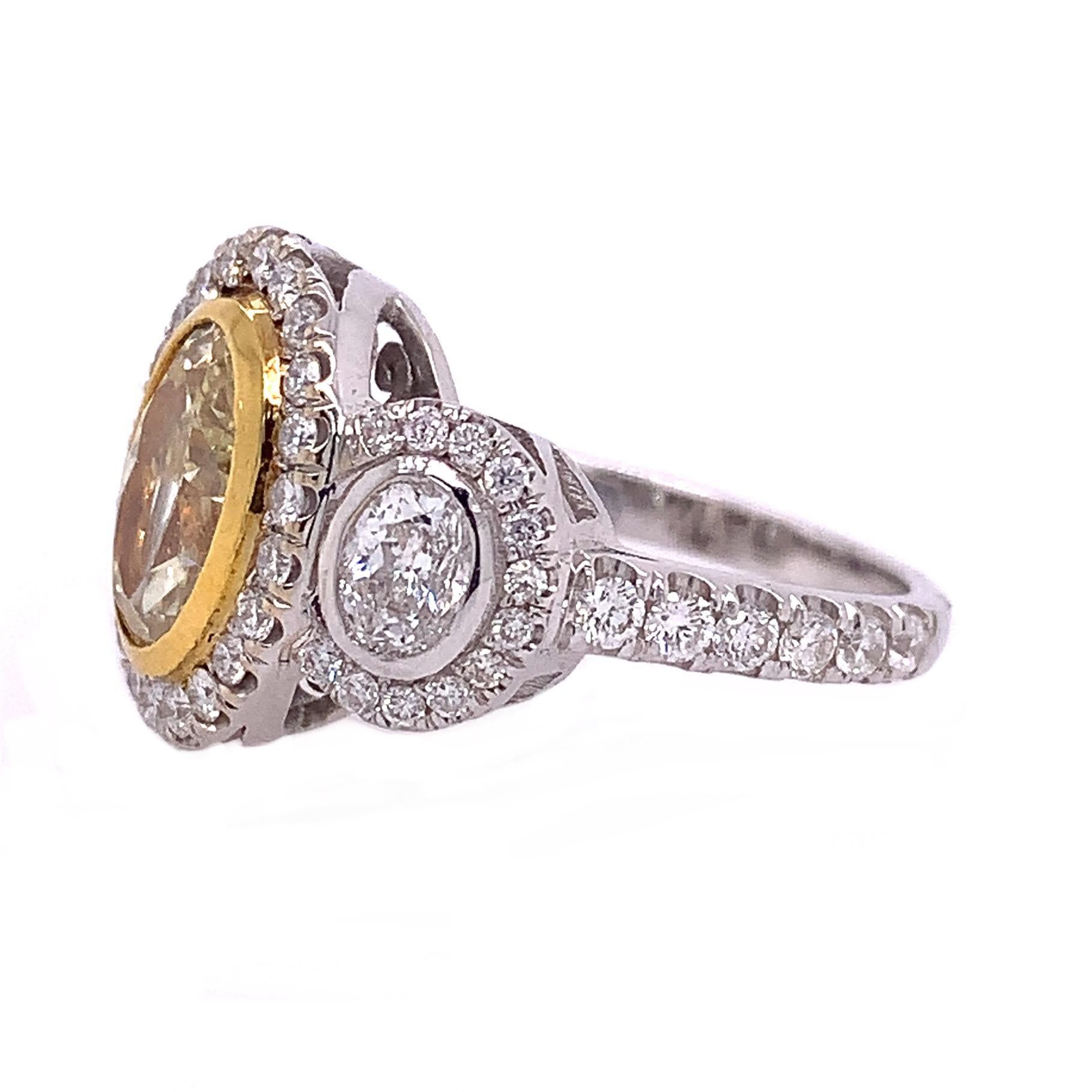 18K White and Yellow Gold
Fancy Diamond: 1.71ct total weight.
Diamond: 1.83ct total weight.