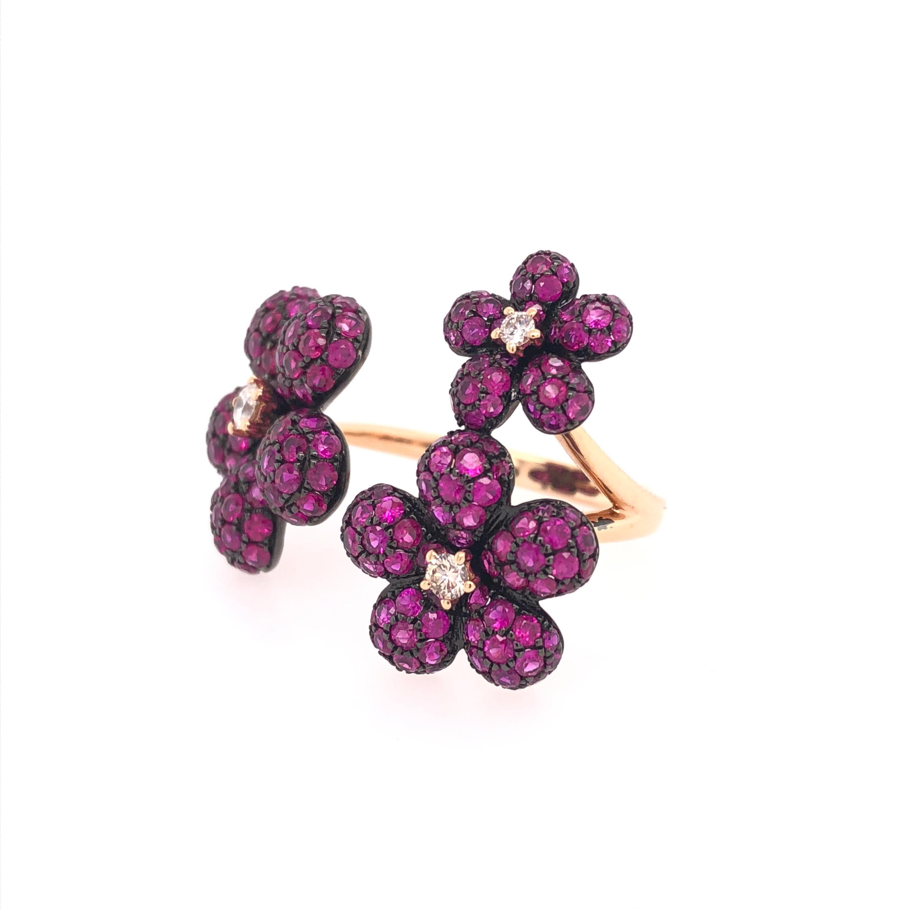 Ruby Collection

Pavé Ruby and round Diamond flower shaped cocktail ring set in 18K rose gold.

Ruby: 3.16ct total weight.
Diamonds: 0.14ct total weight.
All diamonds are G-H/SI stones.
