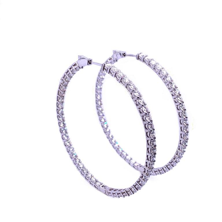 Scintillation Collection

Bright and bold in and out Diamond hoop earrings set in 18K white gold.

Diamonds: 8.65ct total weight.
All diamonds are G-H/SI stones.