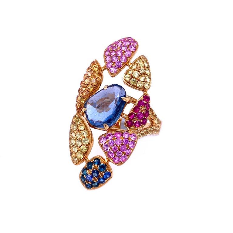 Rainbow Collection 

Oh so unique cocktail ring bursting with color! Featuring a rose cut blue Sapphire slice center stone surrounded by bright multi colored Sapphires. Set in 18K yellow gold.

Multi Colored Sapphires: 5.17ct total weight.


