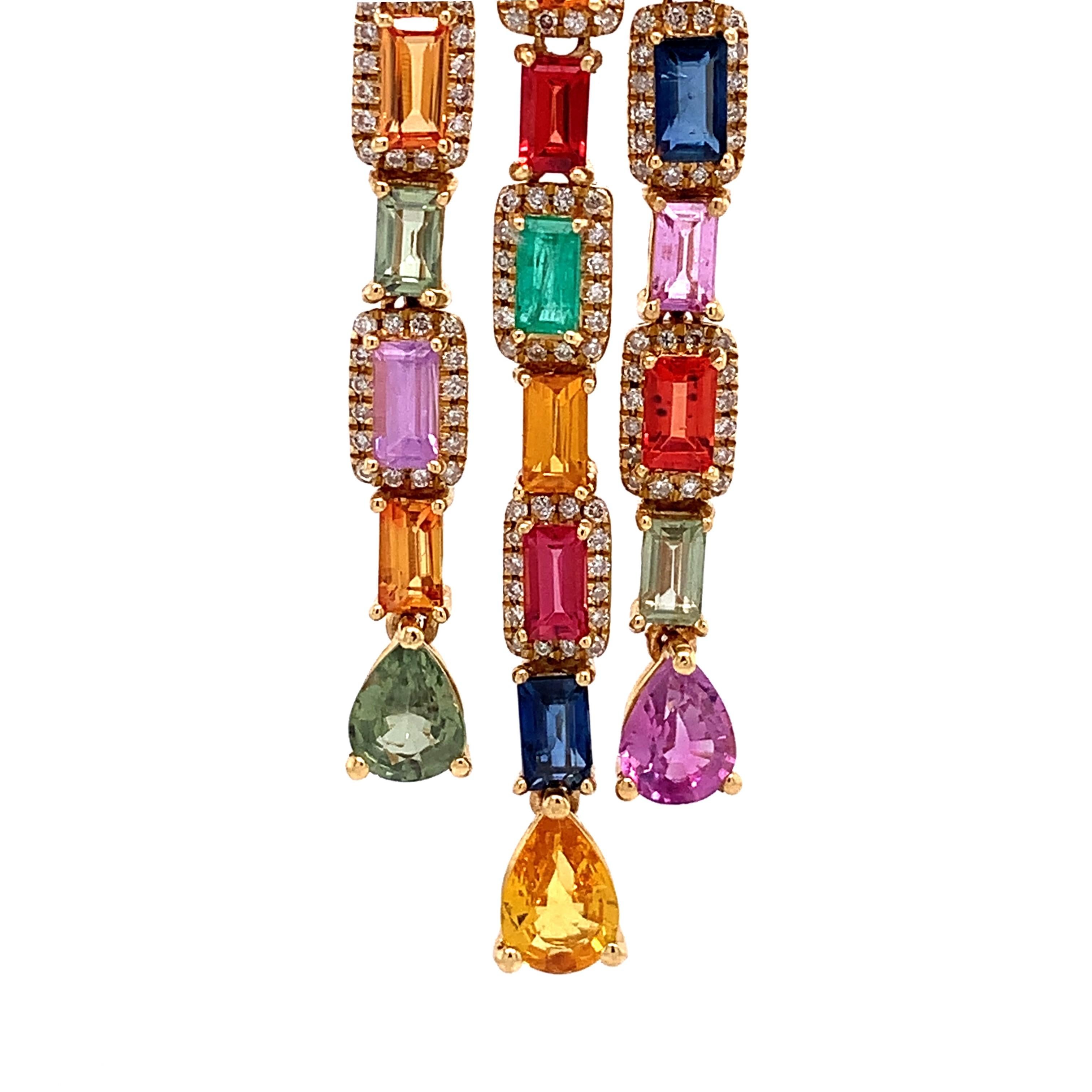 Rainbow Collection

The chromatic intensity of multi-colored Sapphires totaling 13.19 carats accented by sparkling Diamonds in a captivating 3-row dangle design set in Yellow Gold