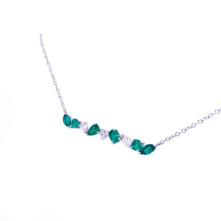 Green Lagoon Collection

Simple with a pop of color. Multi-shape Emerald and Diamond bar necklace set in 18k white gold. 

Emeralds: 1.72ctw.
Diamonds: 0.48ctw.
All diamonds are G-H/SI stones.