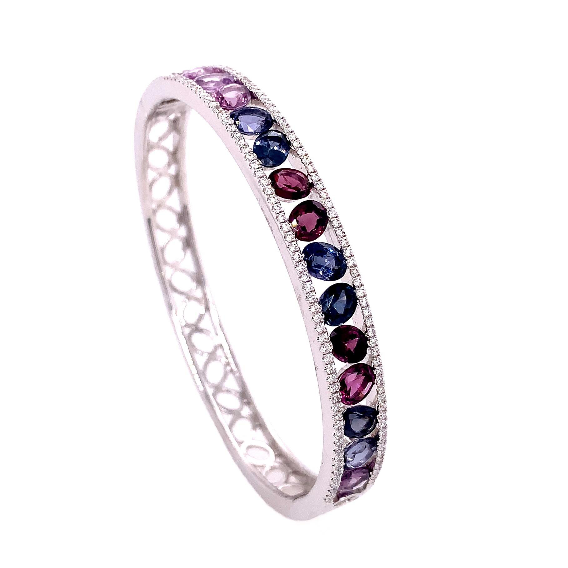18K White Gold
Multicolor Sapphire: 6.08ct total weight.
Diamond: 0.59ct total weight.
All diamonds are G-H/SI stones.