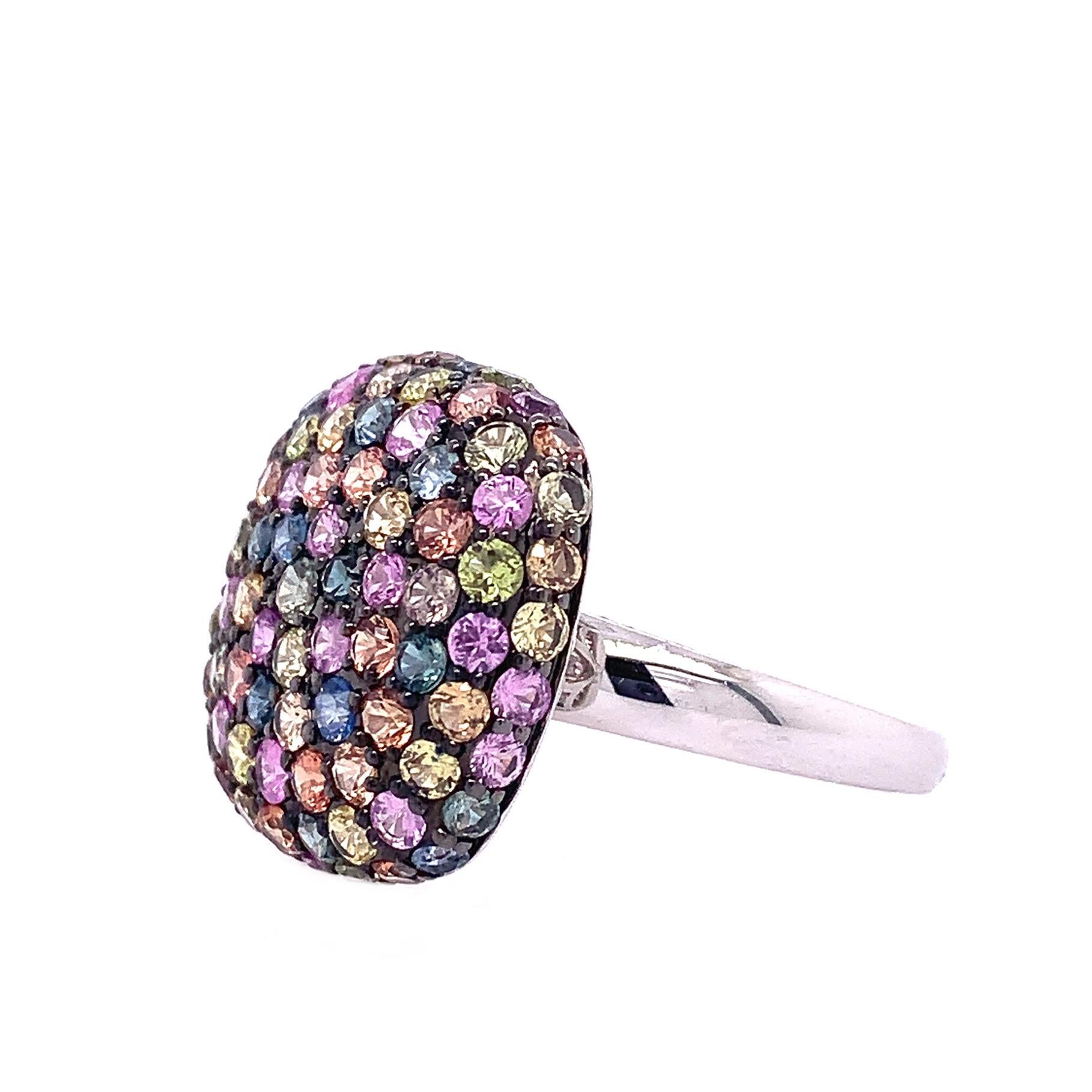 Rainbow Collection

Multi color Sapphire dome ring pave set in 18K white gold. Size 6.5 U.S.   

Multi color Sapphire : 3.32 ct total weight.
