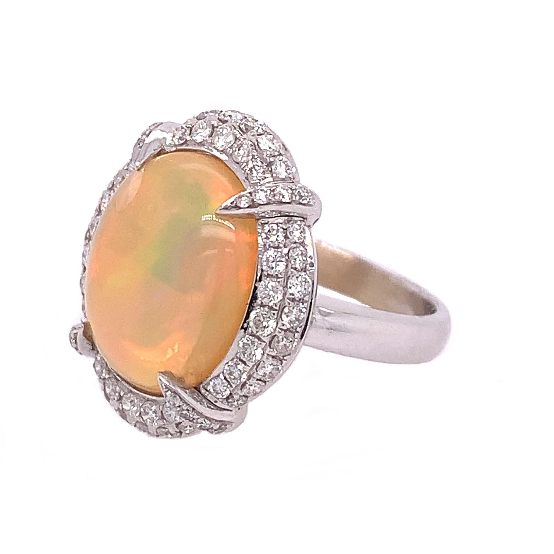 18K White Gold
Opal: 5.21ct total weight.
Diamond: 0.85ct total weight.
All diamonds are G-H/SI stones.