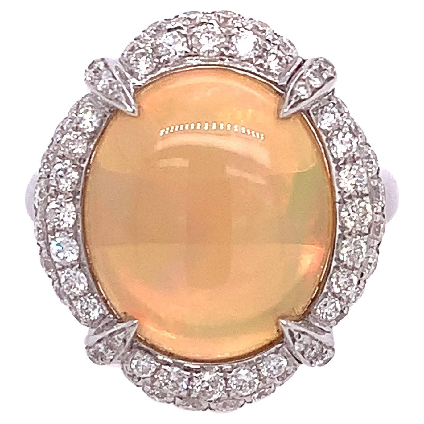 RUCHI Ethiopian Opal & Diamond Halo White Gold Claw Ring For Sale