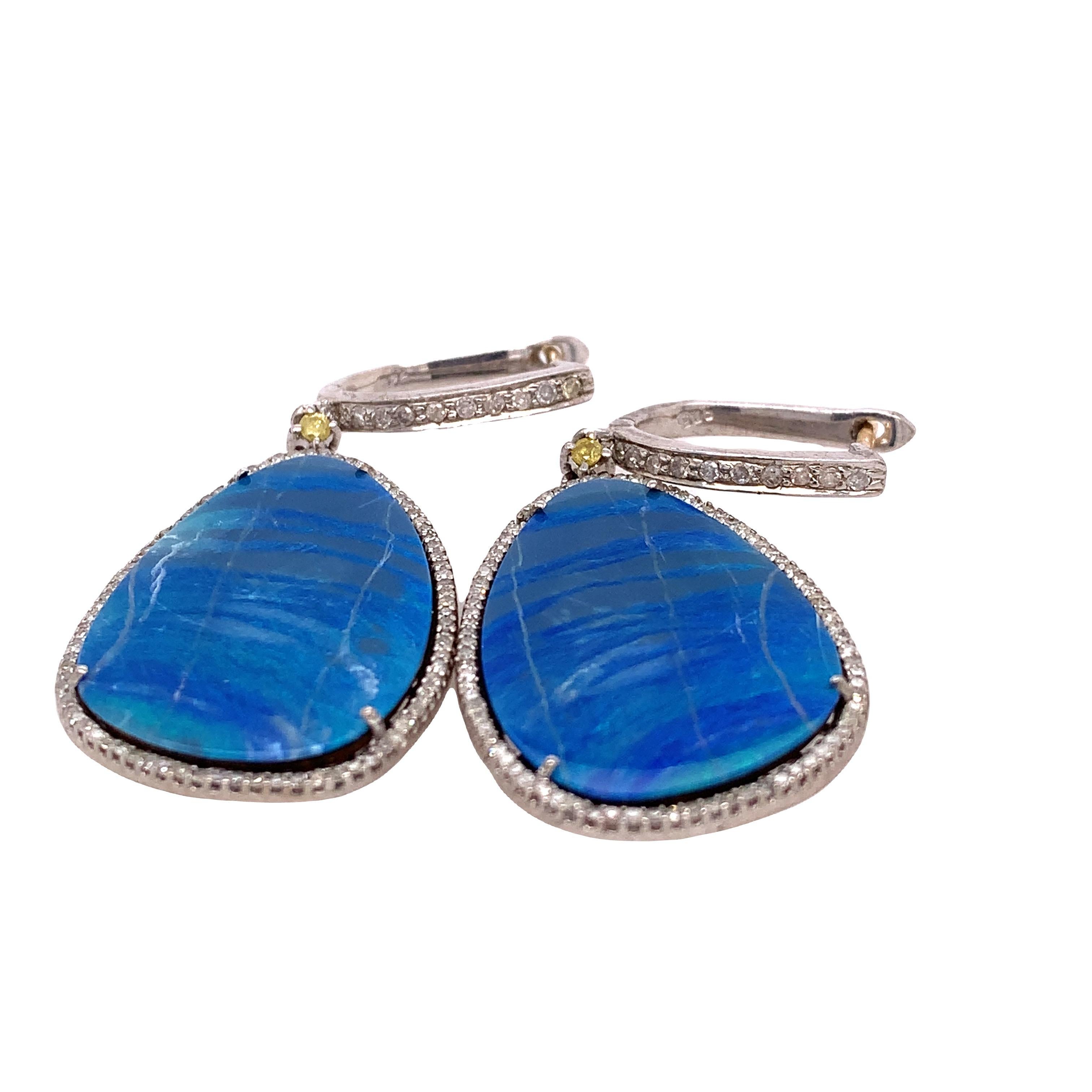 Life in color collection

Bright blue color Australian Opals are wrapped by diamond set in Sterling Silver. Delicate Opal Jewelry for evening and everyday wear.

Opal: 15.36ct total weight
Diamond: 0.91ct total weight