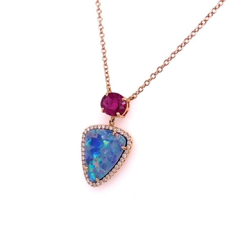 Ocean Bliss Collection

Australian Opal with Diamond halo and Ruby pendant set in 18 karat rose gold. 

Opal: 3.96ct total weight. 
Ruby: 1.41ct total weight. 
Diamonds: 0.26ct total weight. 
All diamonds are G-H/SI stones.