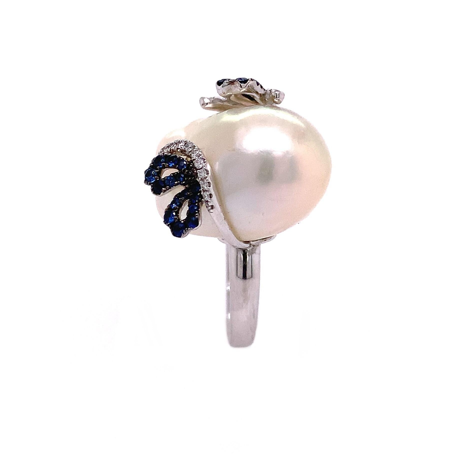 18K White Gold
Pearl: 3.85grm total weight
Blue Sapphire: 0.39ct total weight 
Diamond: 0.13ct total weight
All diamonds are G-H/SI stones.