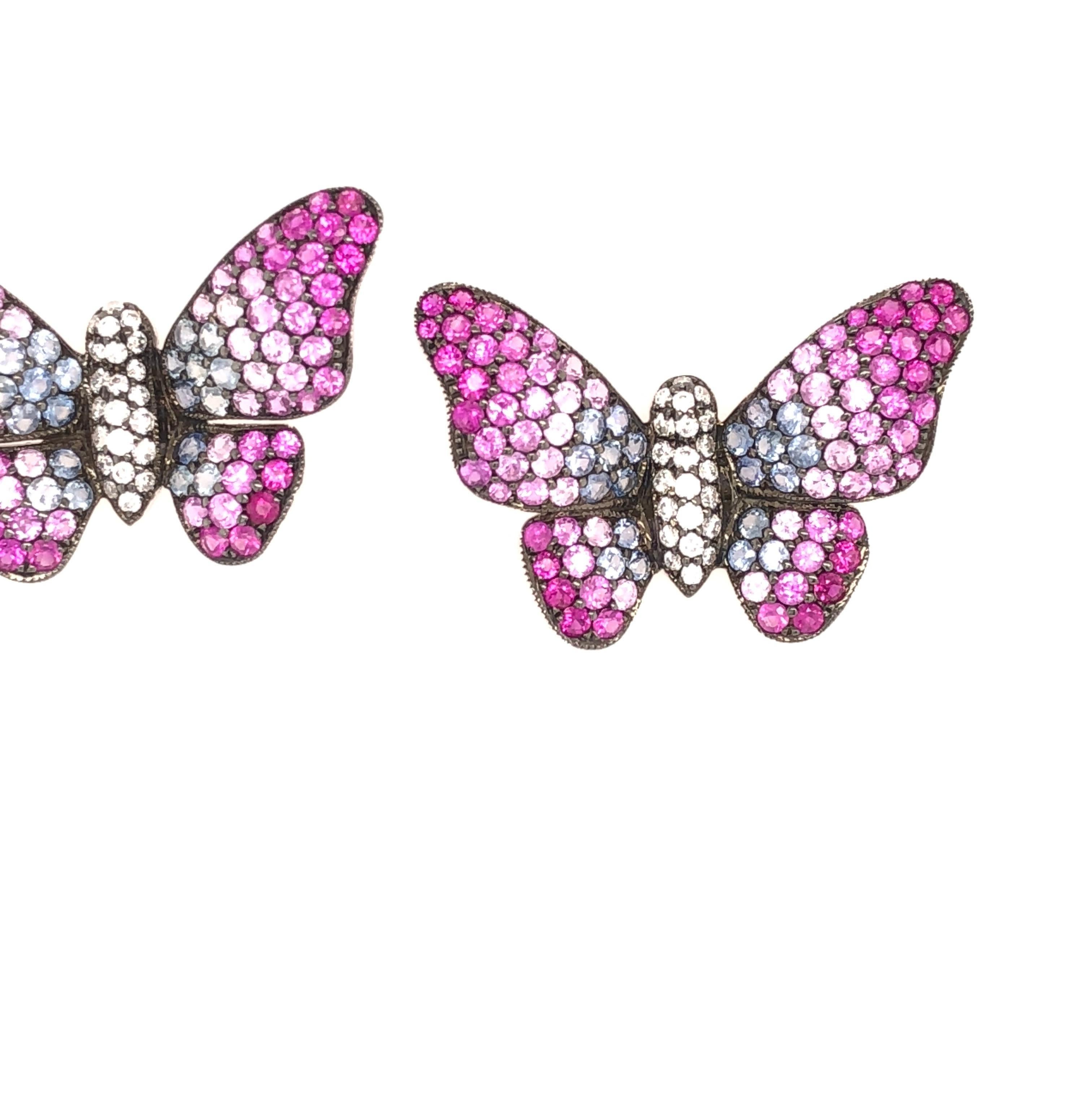Gradient Collection 

Pink and blue Sapphire gradient with Diamonds butterfly stud earrings set in 18K white gold.

Sapphire: 2.83ct total weight.
Diamonds: 0.23ct total weight.
All diamonds are G-H/SI stones.
Length - is approximately