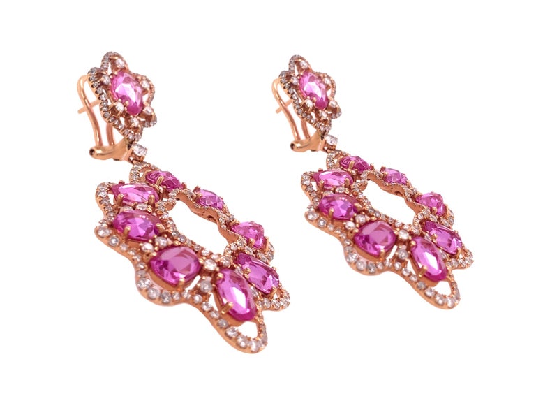 Pink Rose Collection

Dangling earrings featuring fancy shape pink Sapphire with white Diamond. Set in 18K rose gold.

Pink Sapphire: 14.48ct total weight.
Diamond: 3.29ct total weight.
All diamonds are G-H/SI stones.