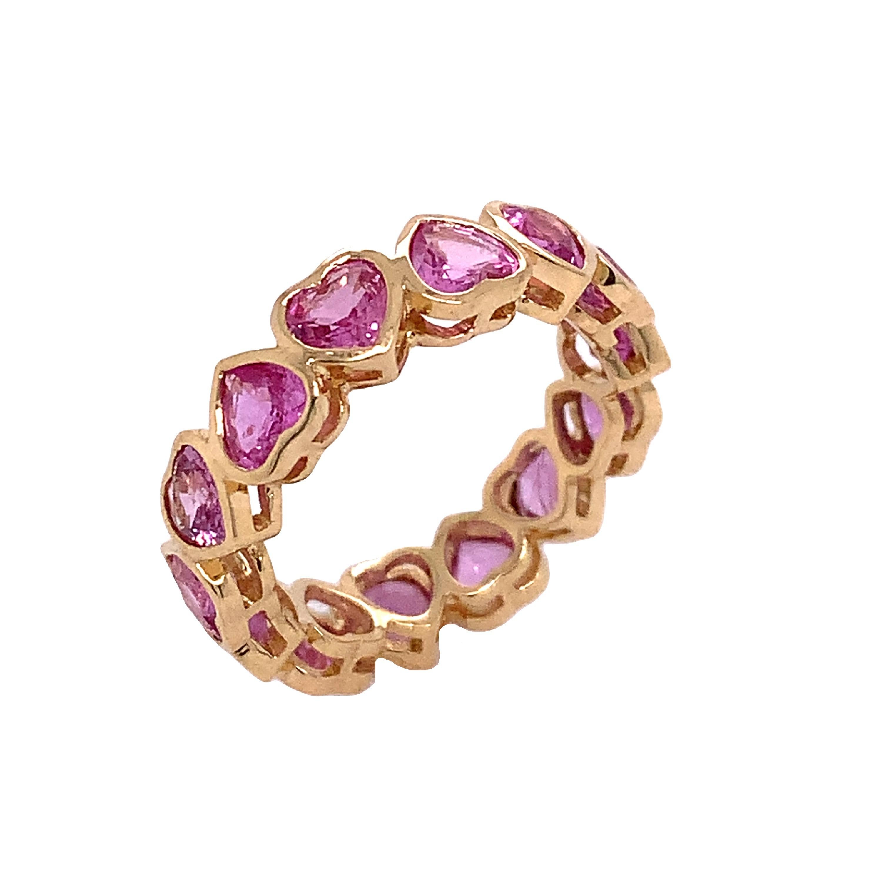 Contemporary RUCHI Heart-Shaped Pink Sapphire Yellow Gold Bezel Eternity Band For Sale