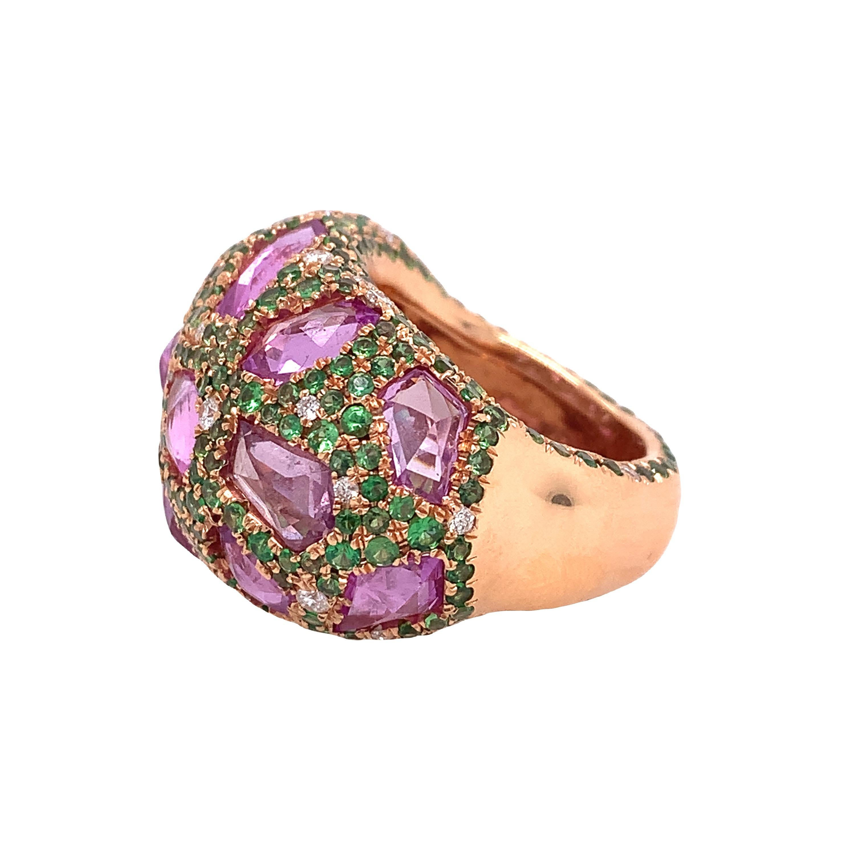 18K Rose Gold.
Pink Sapphire: 7.70ct total weight
Tsavorite: 3.49ct total weight
Diamond: 0.36ct total weight
All diamonds are G-H/SI stones.