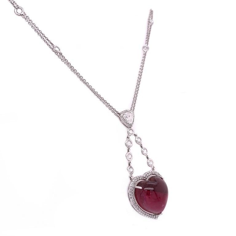 Exclusive Collection

Enchanting rich pink Tourmaline heart cabochon with Diamond halo and double rose cut Diamond by the yard chain. Set in 18K white gold. 

Pink Tourmaline: 17.95ct total weight.
Diamonds: 1.73ct total weight.
All diamonds are