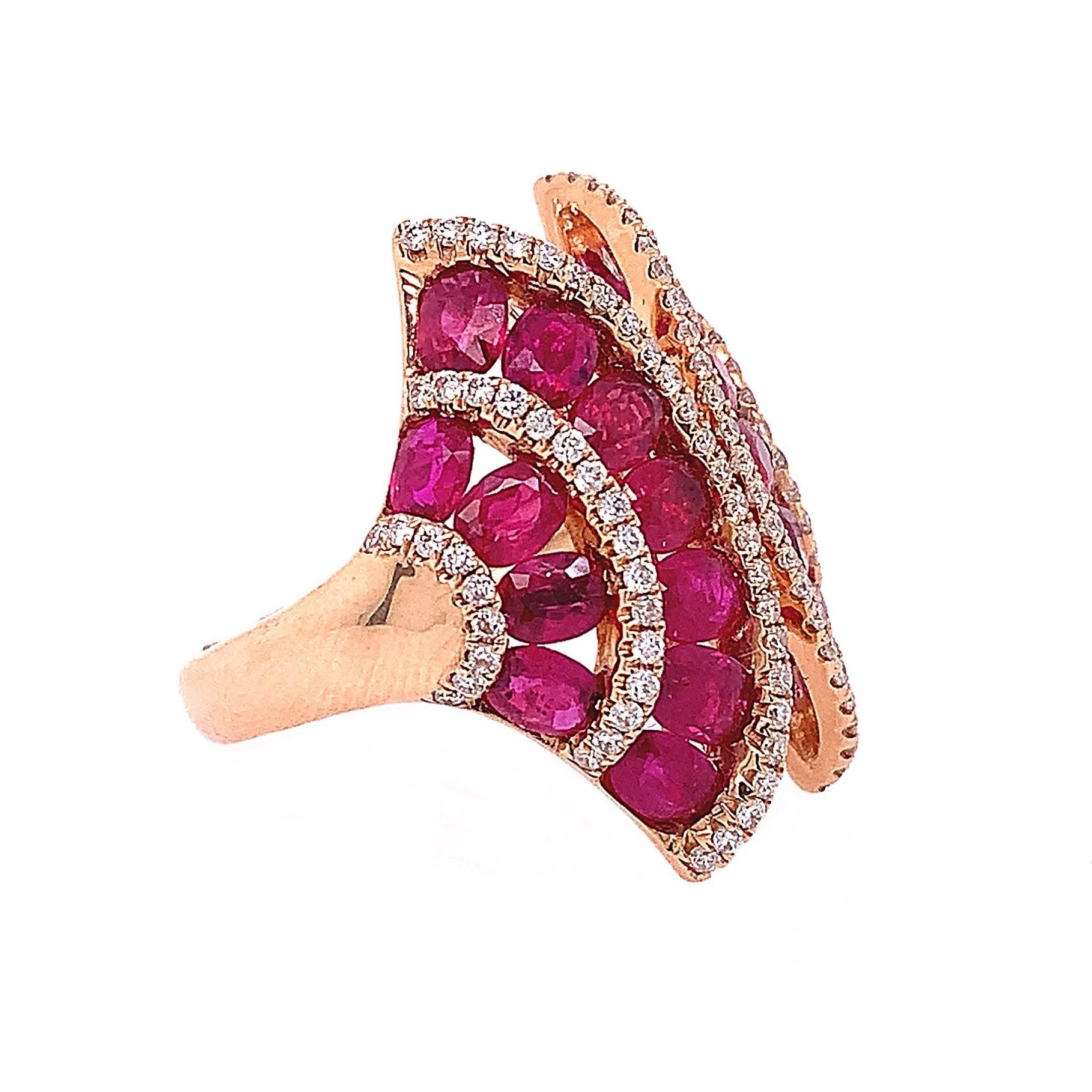 Oval shape rubies with diamonds in a fan shaped ring set in 18K Rose Gold.

Ruby: 4.53ct total weight
Diamond: 0.49ct total weight.
All diamonds are G-H/SI stones.
