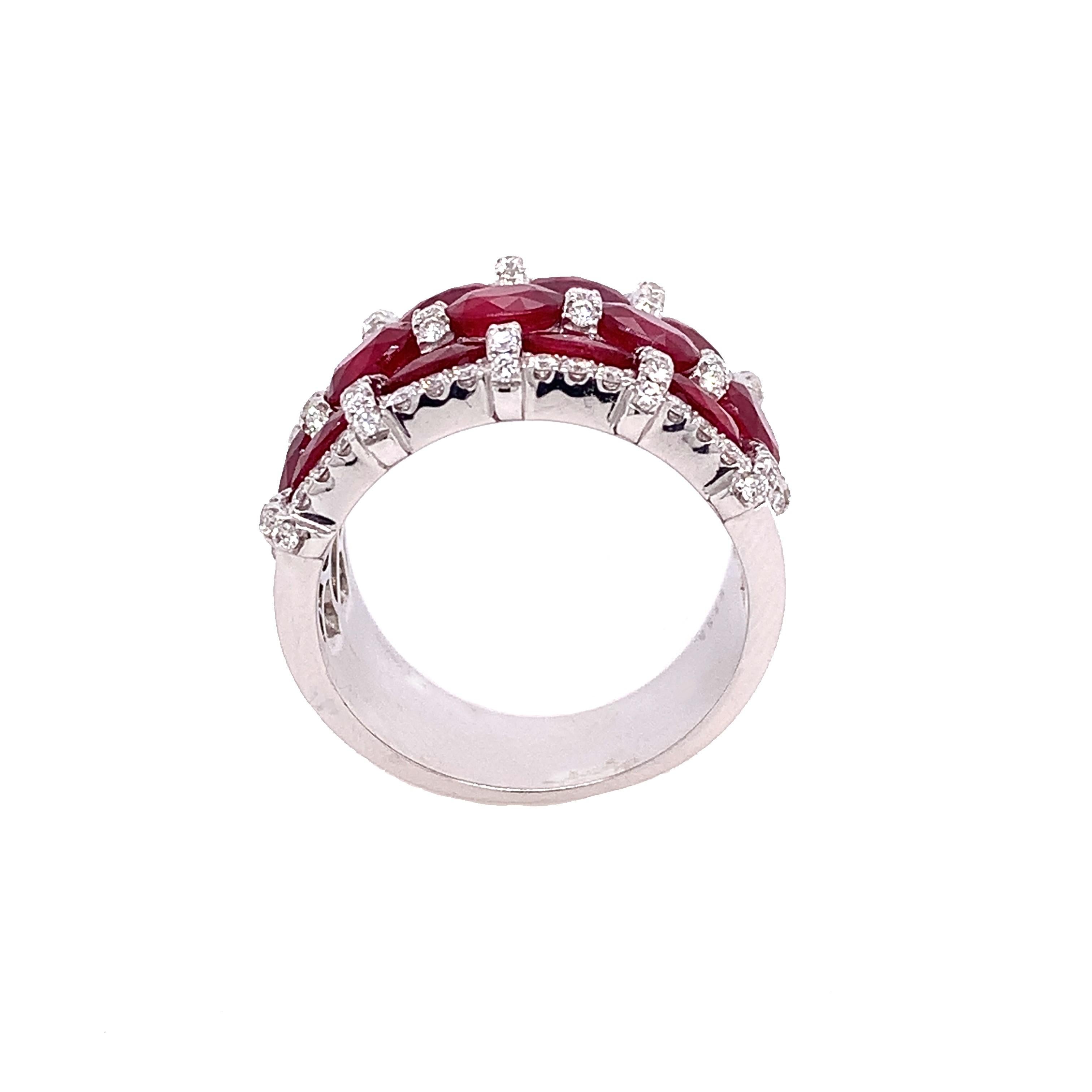 Passion Collection

Oval shape Rubies combine with Diamonds to form sophisticated wide band crafted in 18 K White Gold.

Ruby: 5.80ct total weight.
Diamond: 0.73ct total weight.
All diamonds are G-H/SI stones.
