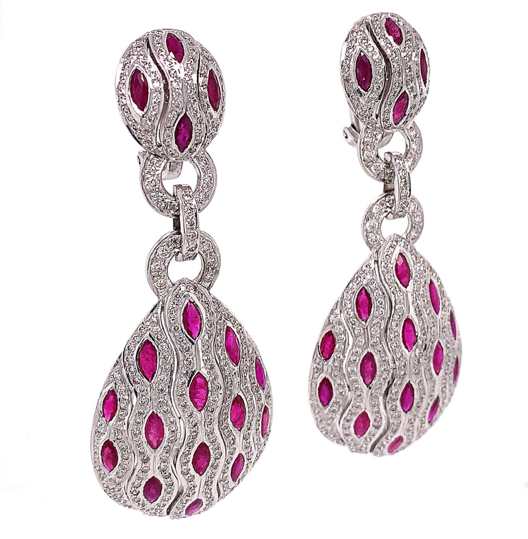 18K White Gold
Ruby: 5.80ct total weight.
Diamond: 3.51ct total weight.
All diamonds are G-H/SI stones.
