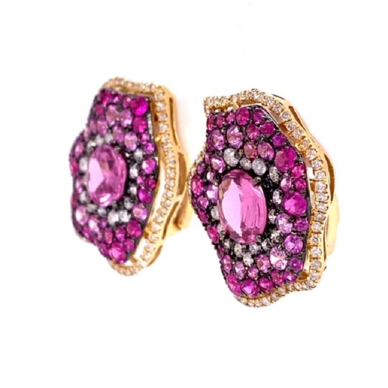 Pink Abyss Collection

Ruby, pink Sapphire and Diamond statement earrings featuring rose cut pink Sapphire center stones set in 18 karat yellow gold. 

Ruby: 1.17ct total weight.
Pink Sapphire:3.29ct total weight.
Diamonds: 0.79ct total weight. 
All
