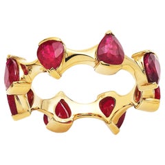 RUCHI Bague ondulée en or jaune avec rubis en forme de poire alternée