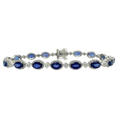 RUCHI Bracelet en or blanc avec saphir bleu ovale et diamants brillants