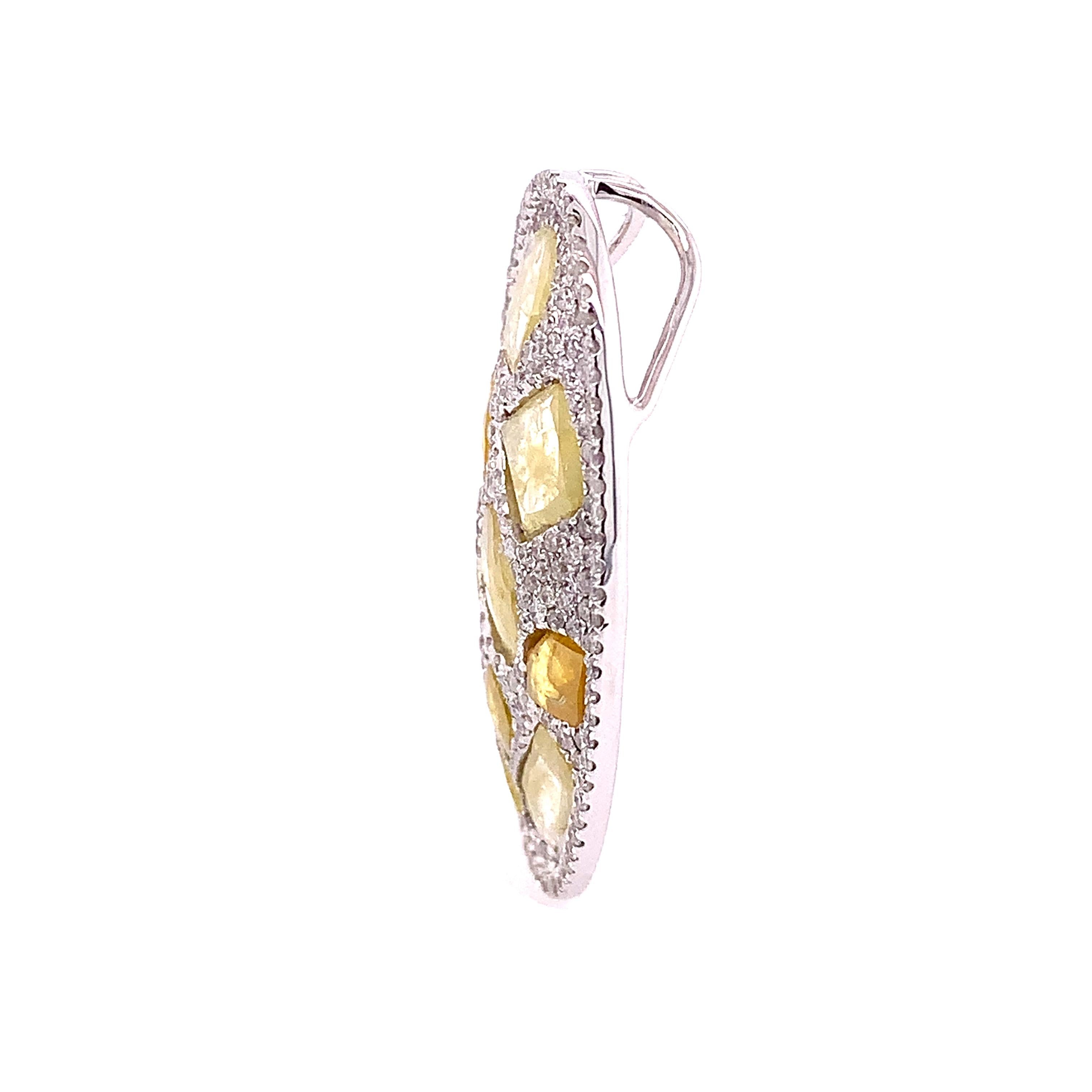 18K White and Yellow Gold
 
Pendant:
Slice Diamond: 1.83ct total weight.
Diamond: 0.75ct total weight.
All Diamonds are G-H/SI stones.

Necklace: 
Yellow Diamond beads: 36.96ct total weight.
48 inch wrap chain 
