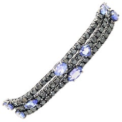 RUCHI Bracelet à trois rangs en tanzanite et diamant noir rhodié