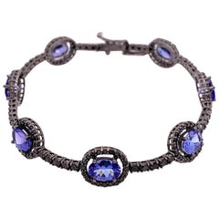 RUCHI Bracelet tennis Tanzanite et diamant noir en or rhodié noir