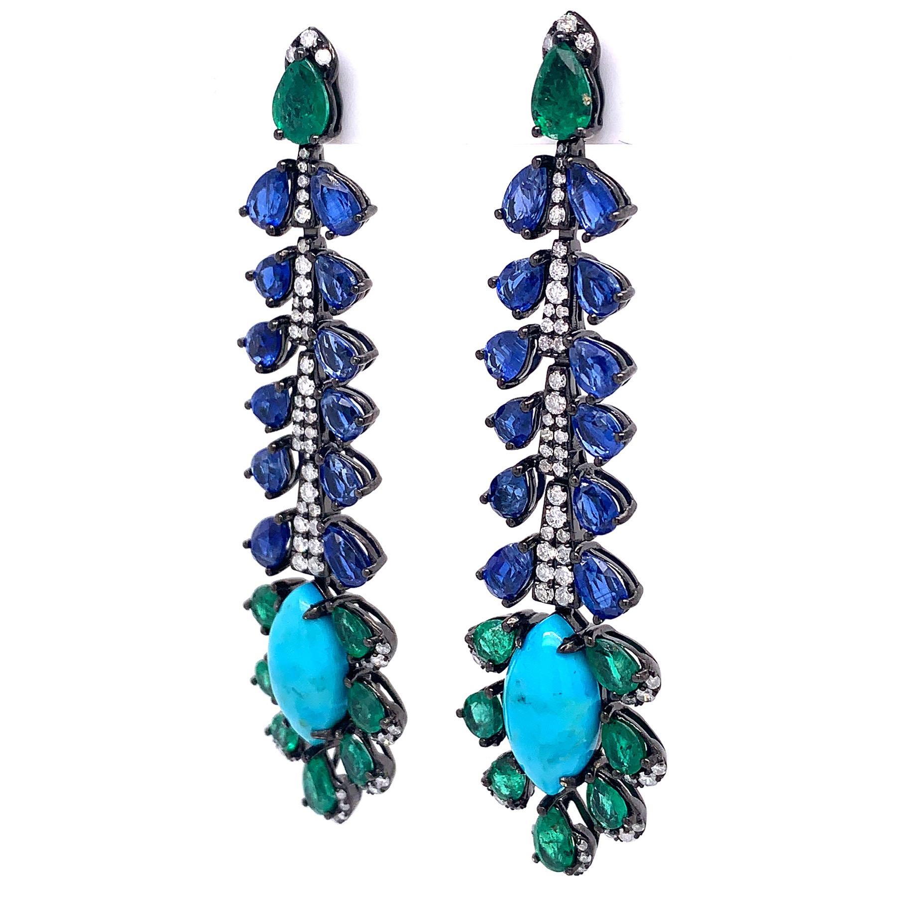Earthy Hues Collection

Turquoise, Kyanite, Emerald and Diamond leaf chandelier earrings set in 18K black rhodium gold.

Turquoise: 4ct total weight.
Emerald: 2.97ct total weight.
Kyanite: 5.8ct total weight.
Diamonds: 0.87ct total weight.
All